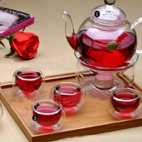 قوری-پیرکس-با-شمع-گرم-کننده قوری پیرکس-قوری با شمع گرم کننده-تهیه چای فوری-قوری مسافرتی